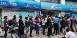 Yes Bank customers queue for cash after India’s central bank takes control